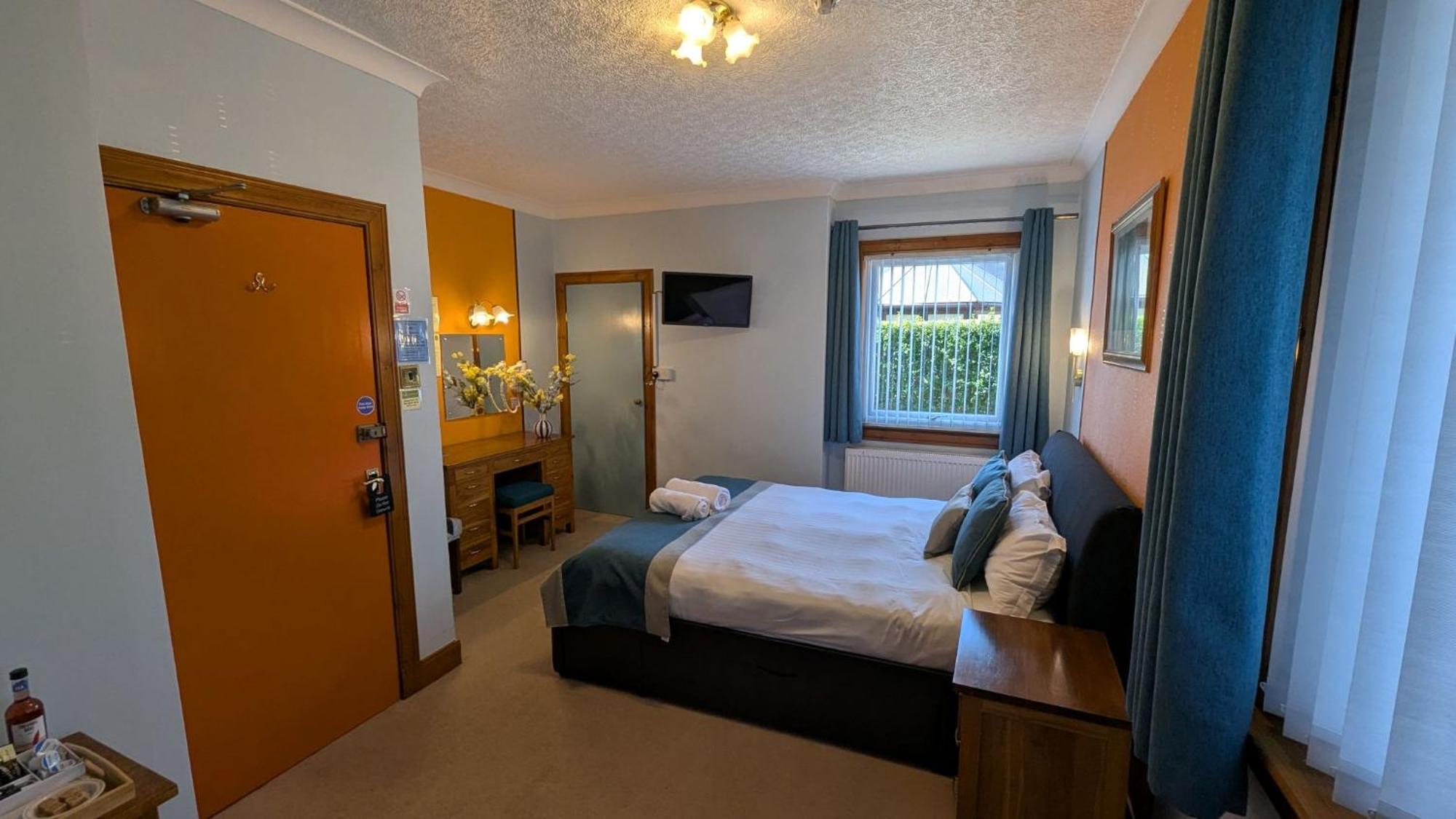 Kamer met Kingsize Bed